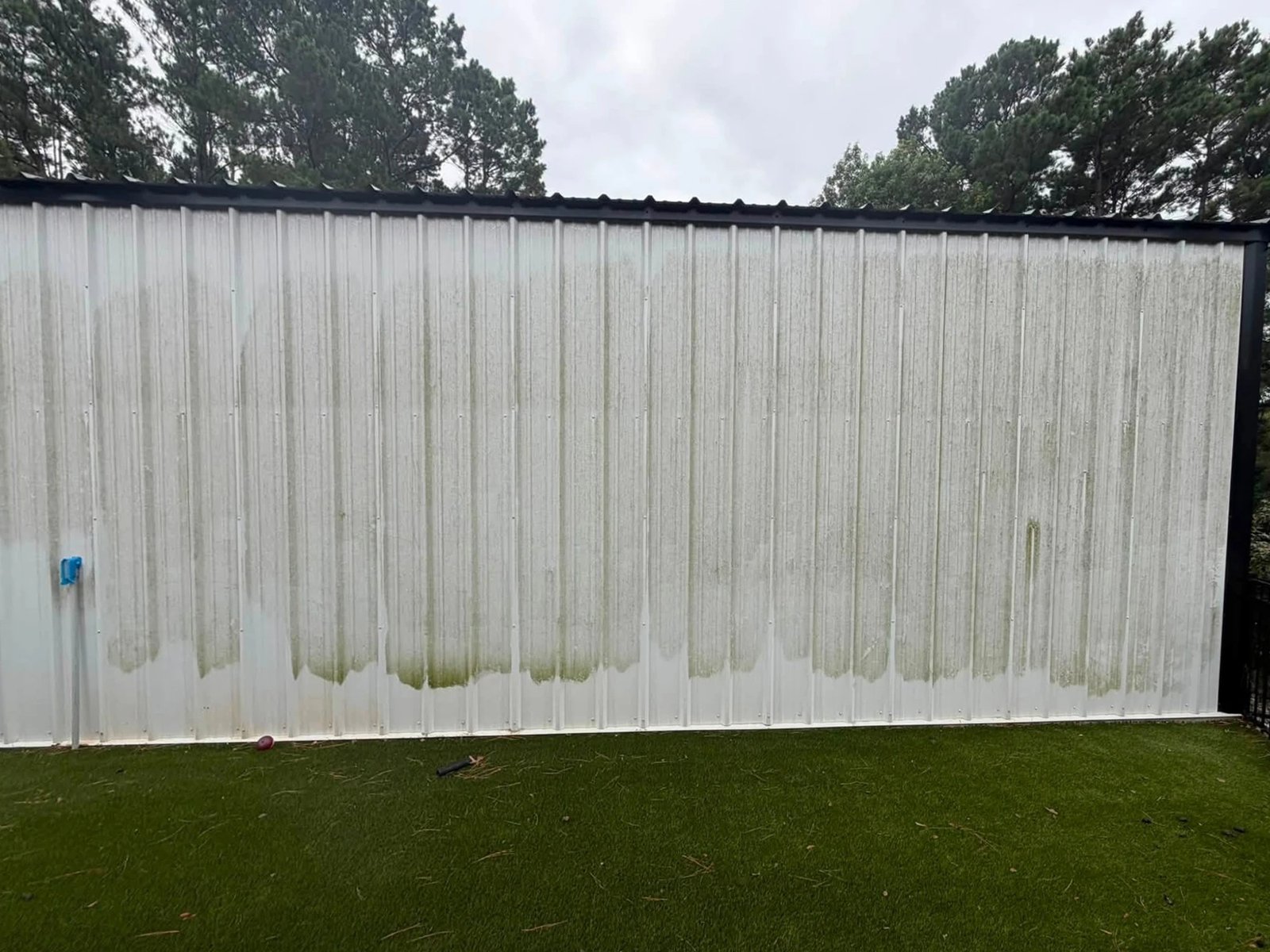 Commercial metal building before cleaning